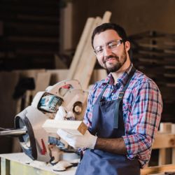 handsome-carpenter-in-protective-glasses-is-lookin-2024-11-03-00-45-23-utc (1)